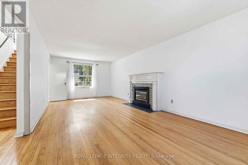 1842 Playfair Drive, Ottawa, ON - Indoor Photo Showing Living Room With Fireplace