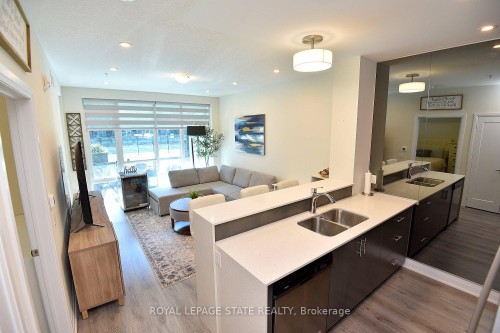 145-16 Concord Place, Grimsby, ON - Indoor Photo Showing Kitchen With Double Sink