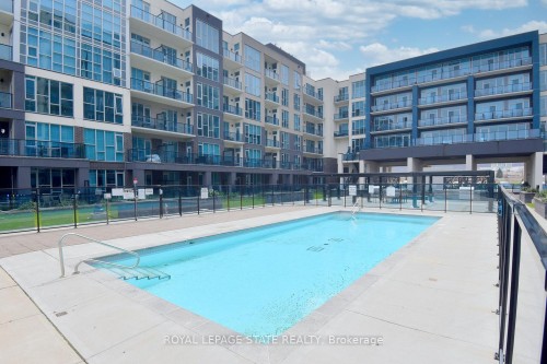 145-16 Concord Place, Grimsby, ON - Outdoor With In Ground Pool
