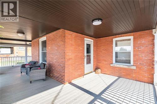 View of wooden terrace - 120 Caithness Street E, Caledonia, ON - Outdoor With Deck Patio Veranda With Exterior