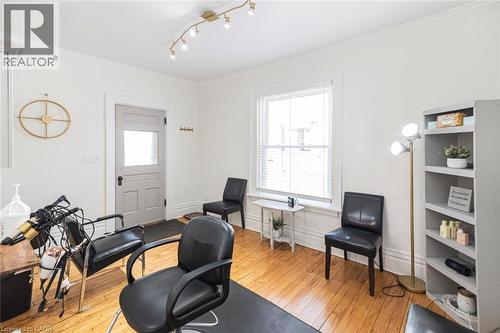 Home office featuring ornamental molding and light wood-style flooring - 120 Caithness Street E, Caledonia, ON - Indoor Photo Showing Office