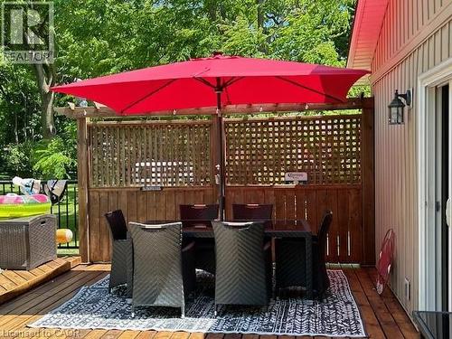Deck with outdoor dining space - 120 Caithness Street E, Caledonia, ON - Outdoor With Deck Patio Veranda With Exterior