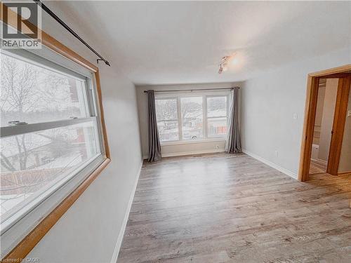 Unfurnished room featuring light wood-style flooring - 122 Weber Street S, Waterloo, ON - Indoor Photo Showing Other Room