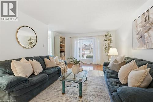 Living room with wood finished floors - 56 Rushbrook Drive, Kitchener, ON - Indoor Photo Showing Living Room