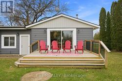 Front deck leading the sliding doors of the home - 