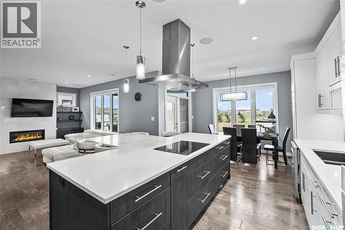 4357 Albulet Drive, Regina, SK - Indoor Photo Showing Kitchen With Fireplace With Upgraded Kitchen