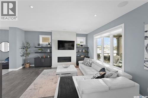 4357 Albulet Drive, Regina, SK - Indoor Photo Showing Living Room With Fireplace
