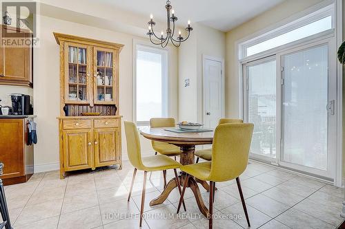 breakfast room with walk-out to patio - 40 Outer Banks Drive N, Markham, ON - Indoor Photo Showing Dining Room