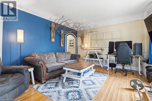 Large bright room with wood flooring - 31 Bingeman Street, Kitchener, ON - Indoor Photo Showing Living Room