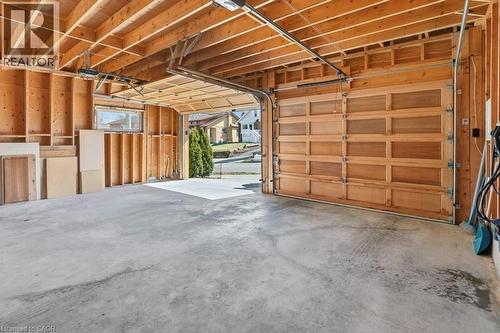 Large double car garage built in 2020 - 859 Queen'S Boulevard, Kitchener, ON - Indoor Photo Showing Garage