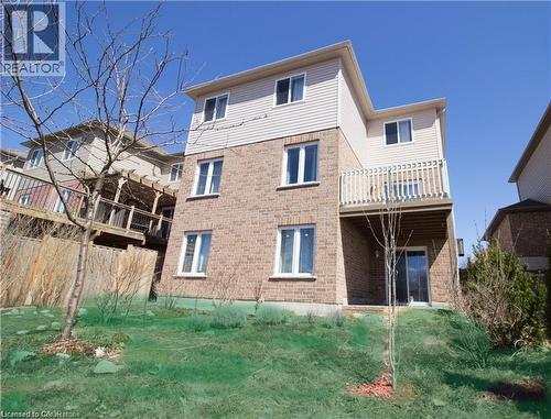 Back of house featuring a balcony - 101 Robert Simone Way, Ayr, ON - Outdoor With Exterior