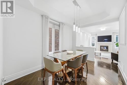 70 Torah Gate, Vaughan, ON - Indoor Photo Showing Dining Room With Fireplace
