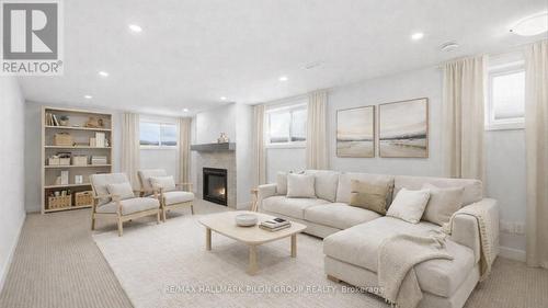 Virtually Staged - 272 Cornice Street, Ottawa, ON - Indoor Photo Showing Living Room With Fireplace