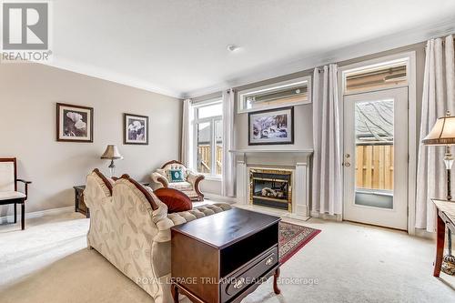 47 - 44 Edgevalley Road, London East (East A), ON - Indoor Photo Showing Living Room With Fireplace