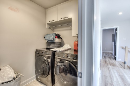 Salle de lavage - 103-9050 Mtée Dobie, Mirabel, QC - Indoor Photo Showing Laundry Room