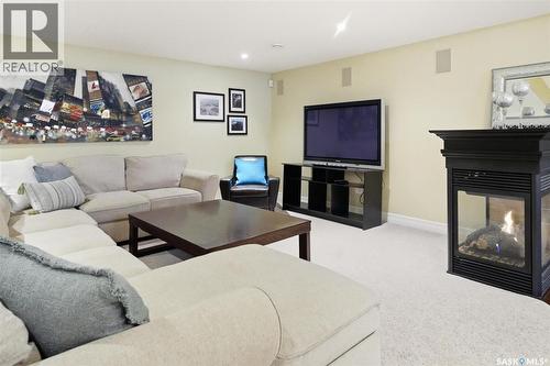 302 Brookhurst Terrace, Saskatoon, SK - Indoor Photo Showing Living Room With Fireplace