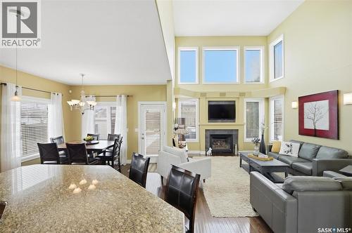 302 Brookhurst Terrace, Saskatoon, SK - Indoor Photo Showing Other Room With Fireplace