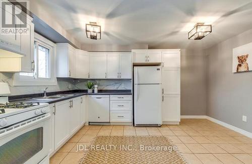8110 Chippewa Road E, Hamilton, ON - Indoor Photo Showing Kitchen With Double Sink