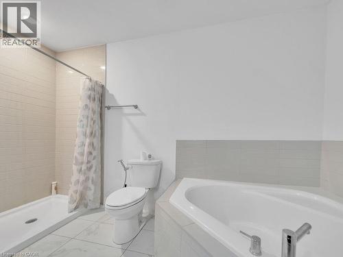 Bathroom with a stall shower and a bath - 30 Times Square Boulevard Unit# #177, Hamilton, ON - Indoor Photo Showing Bathroom