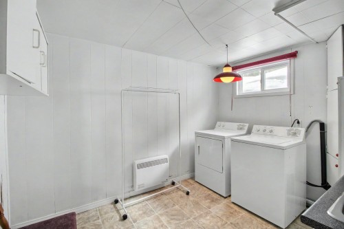 Salle de lavage - 1005 Rue Sabin-Thibault, Rouyn-Noranda, QC - Indoor Photo Showing Laundry Room