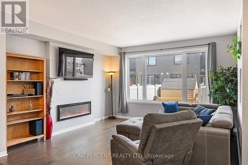 910 Paseana Place, Ottawa, ON - Indoor Photo Showing Living Room With Fireplace