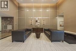 Lobby featuring tile walls - 