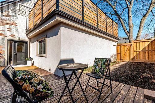 Lower deck with side yard and gate access to front - 14 Reginald Street, Hamilton, ON - Outdoor With Deck Patio Veranda