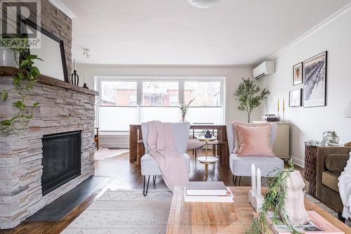 14 Reginald Street, Hamilton, ON - Indoor Photo Showing Living Room With Fireplace