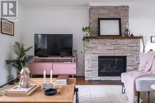 14 Reginald Street, Hamilton, ON - Indoor Photo Showing Living Room With Fireplace