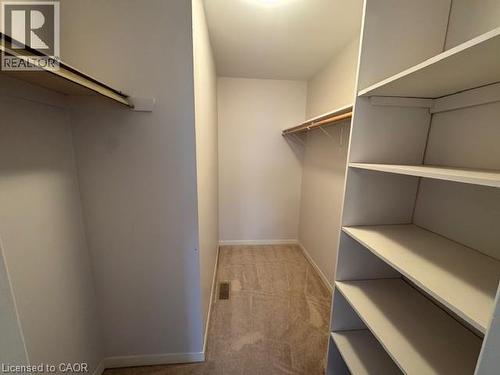 Walk in closet with light colored carpet - 536 Thorndale Drive, Waterloo, ON - Indoor With Storage