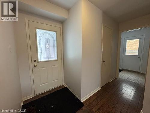 Foyer with dark wood-type flooring and healthy amount of natural light - 536 Thorndale Drive, Waterloo, ON - Indoor Photo Showing Other Room