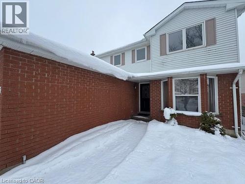 Snow covered property entrance with brick siding - 536 Thorndale Drive, Waterloo, ON - Outdoor