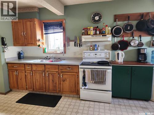 705 Main Street, Zenon Park, SK - Indoor Photo Showing Kitchen With Double Sink
