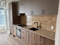 1002 - 5 QUARRINGTON LANE Toronto, ON M3C 0S4