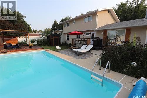 89 Patterson Drive, Regina, SK - Outdoor With In Ground Pool With Deck Patio Veranda With Backyard