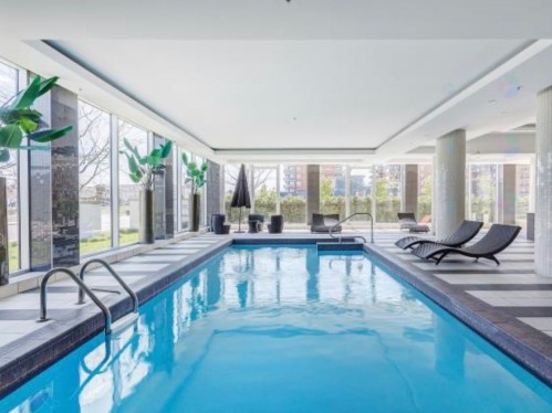 Piscine - 1104-3635 Av. Jean-Béraud, Laval (Chomedey), QC - Indoor Photo Showing Other Room With In Ground Pool