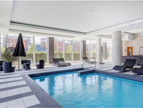 Piscine - 1104-3635 Av. Jean-Béraud, Laval (Chomedey), QC - Indoor Photo Showing Other Room With In Ground Pool
