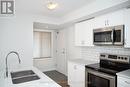 16 - 415 Eldorado Private, Ottawa, ON  - Indoor Photo Showing Kitchen With Stainless Steel Kitchen With Double Sink 