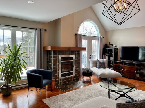 Salon - 261 Ch. Des Cormiers, Piedmont, QC - Indoor Photo Showing Living Room With Fireplace