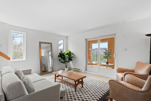 Salle familiale - 40 Ch. Des Catalpas, La Conception, QC - Indoor Photo Showing Living Room