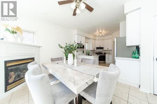 63 Rainbow Valley Crescent, Markham, ON - Indoor Photo Showing Dining Room With Fireplace