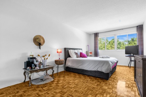 Chambre à coucher principale - 402-40 Av. Du Rhône, Saint-Lambert, QC - Indoor Photo Showing Bedroom
