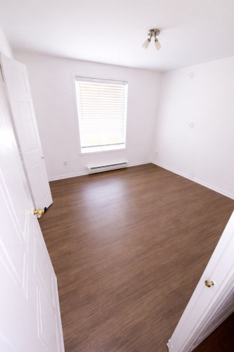 Chambre à coucher - 2-1561 Rue De Gascogne, Laval (Chomedey), QC - Indoor Photo Showing Other Room