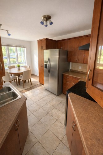 Cuisine - 2-1561 Rue De Gascogne, Laval (Chomedey), QC - Indoor Photo Showing Kitchen With Double Sink
