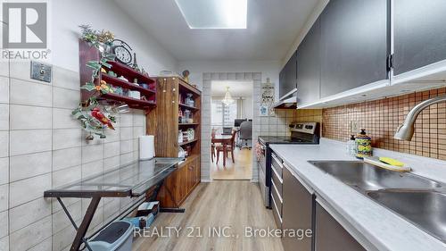 2103 - 5 Massey Square, Toronto, ON - Indoor Photo Showing Kitchen With Double Sink