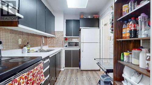 2103 - 5 Massey Square, Toronto, ON - Indoor Photo Showing Kitchen With Double Sink