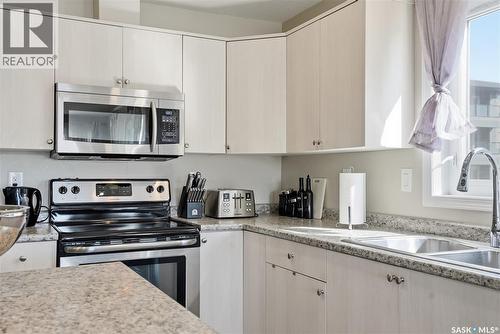 1105 102 Willis Crescent, Saskatoon, SK - Indoor Photo Showing Kitchen With Double Sink