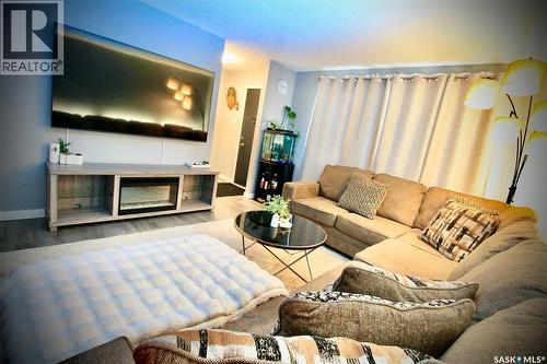 3342 Diefenbaker Drive, Saskatoon, SK - Indoor Photo Showing Living Room With Fireplace