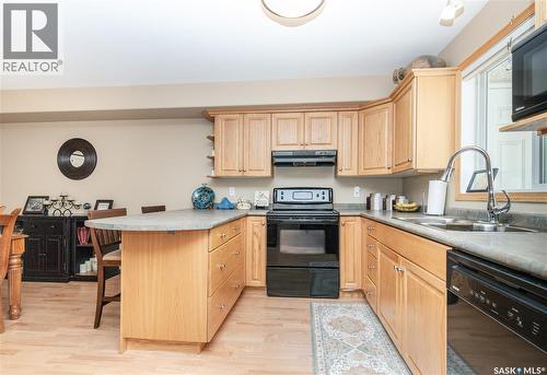 106 314 Nelson Road, Saskatoon, SK - Indoor Photo Showing Kitchen With Double Sink