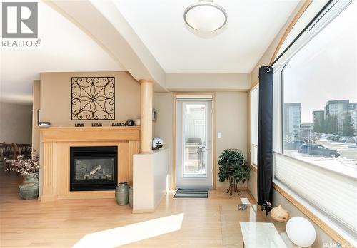 106 314 Nelson Road, Saskatoon, SK - Indoor Photo Showing Living Room With Fireplace